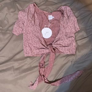 A pink Polly top